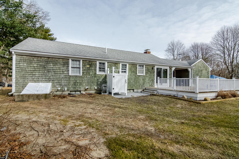 24 Stephen Road Bourne, MA 02532 - Photo 19 of 20 a front view of a house with a garden