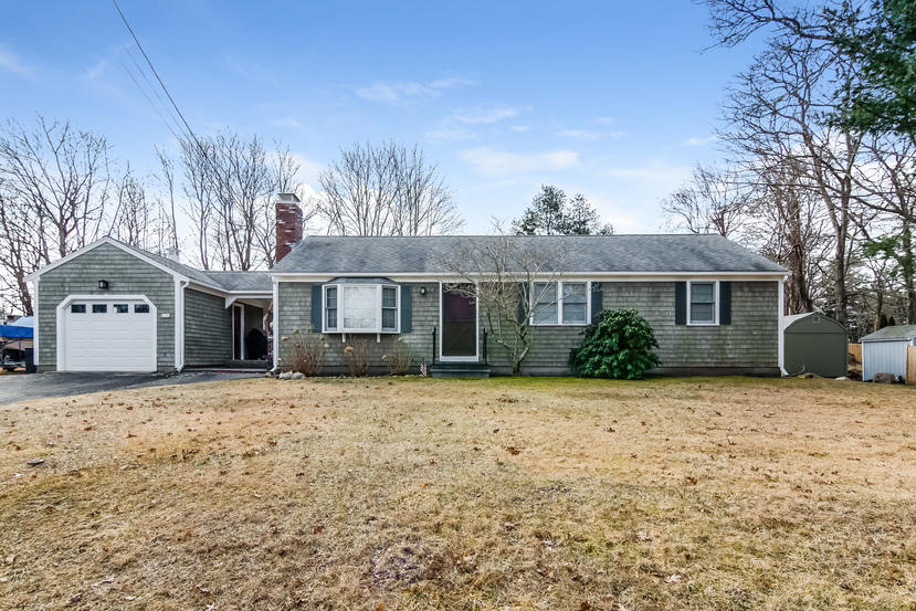 24 Stephen Road Bourne, MA 02532 - Photo 2 of 20 a front view of a house with a yard