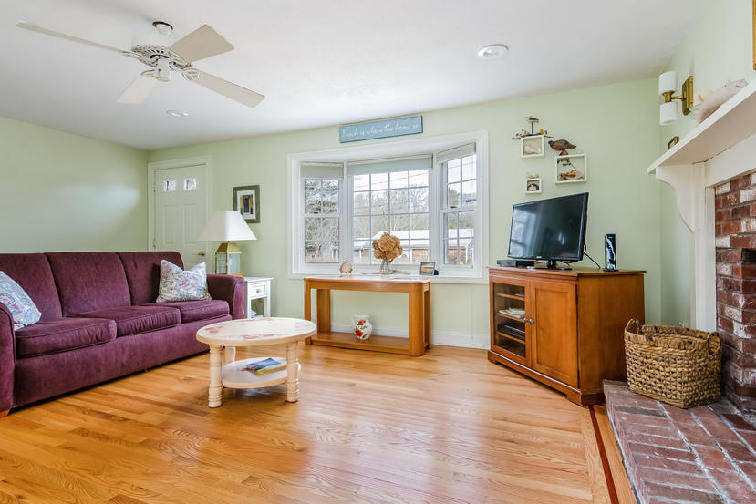 24 Stephen Road Bourne, MA 02532 - Photo 4 of 20 a living room with furniture and a flat screen tv
