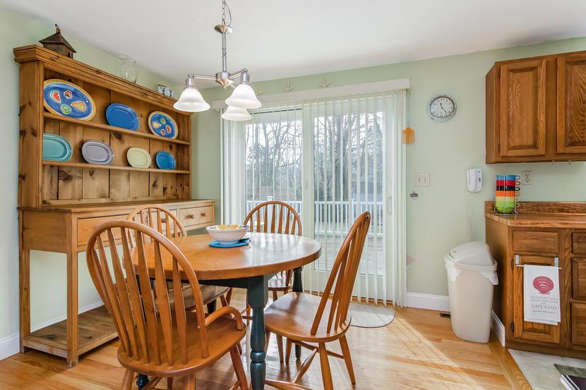 24 Stephen Road Bourne, MA 02532 - Photo 6 of 20 a dining room with furniture a rug and wooden floor