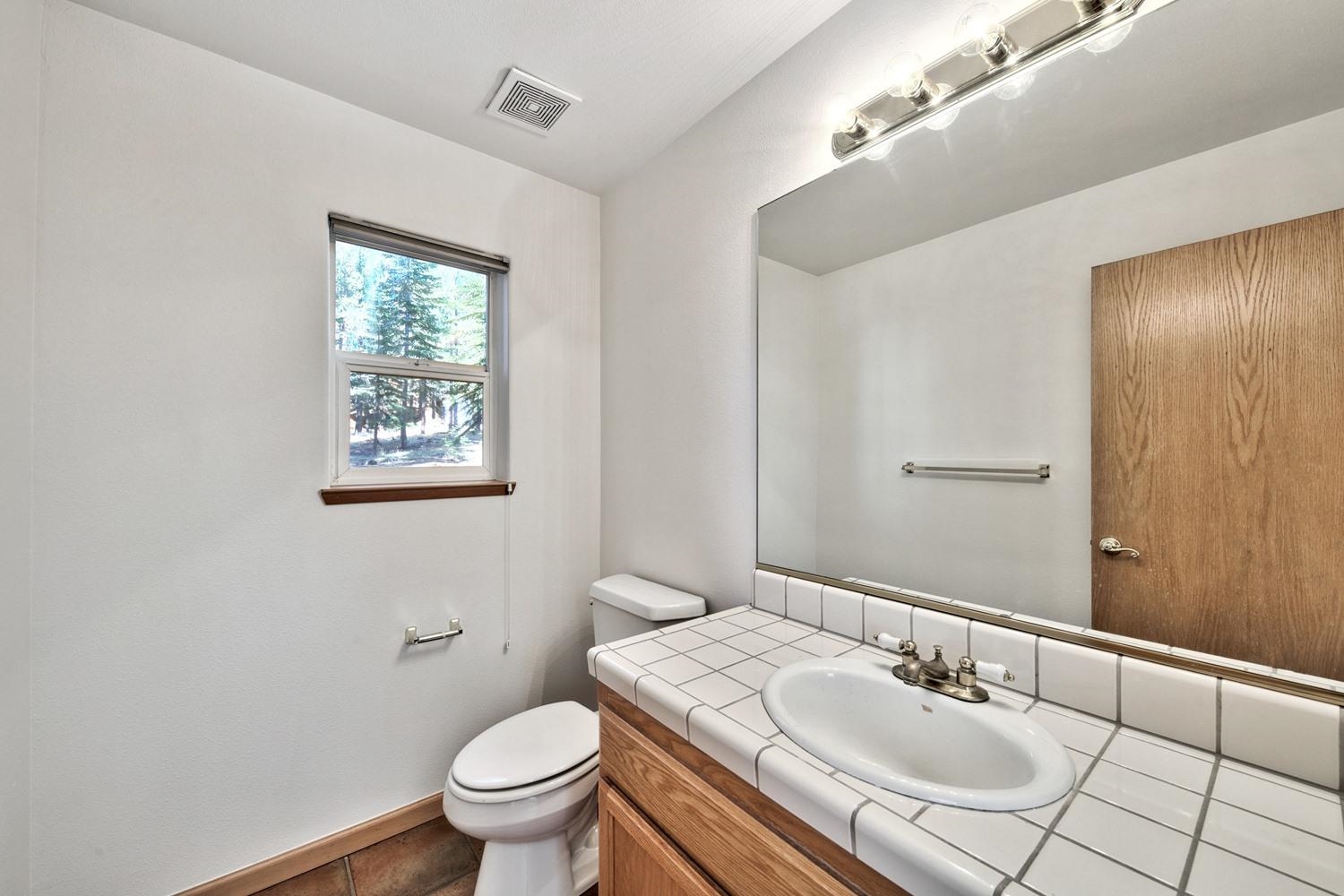 12064 Kitzbuhel Road Truckee, CA 96161 - Photo 12 of 21 Hall Half bath on main level