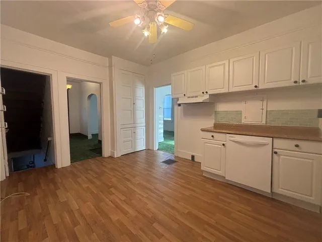 a view of a porch with a door and a porch