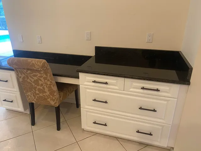 a close view of dresser and chair