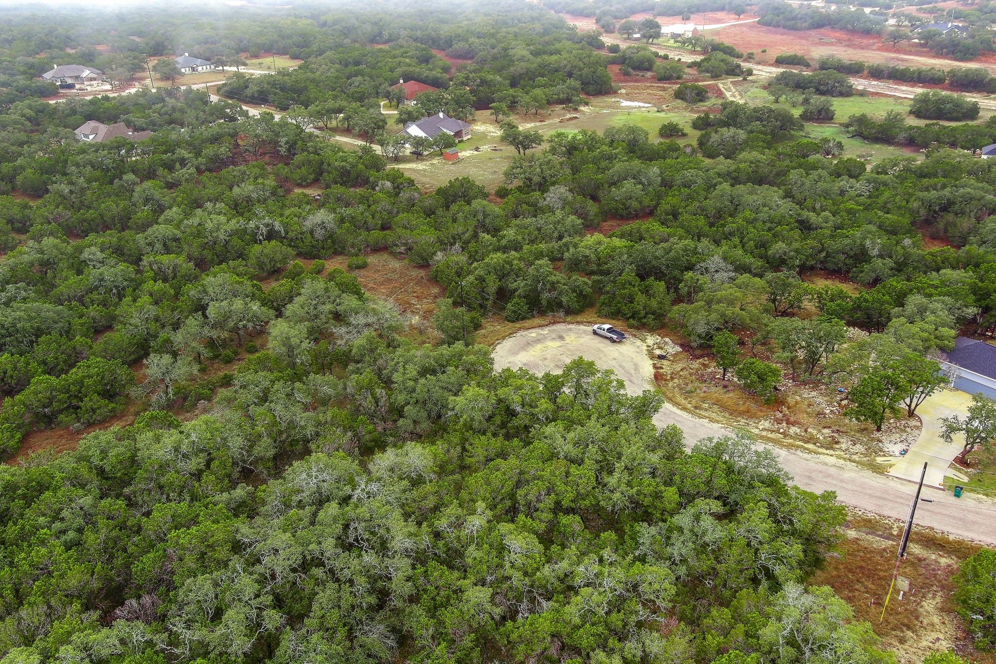 157 Verbena Circle Spring Branch, TX 78070 - Photo 20 of 32 an aerial view of residential houses with outdoor space