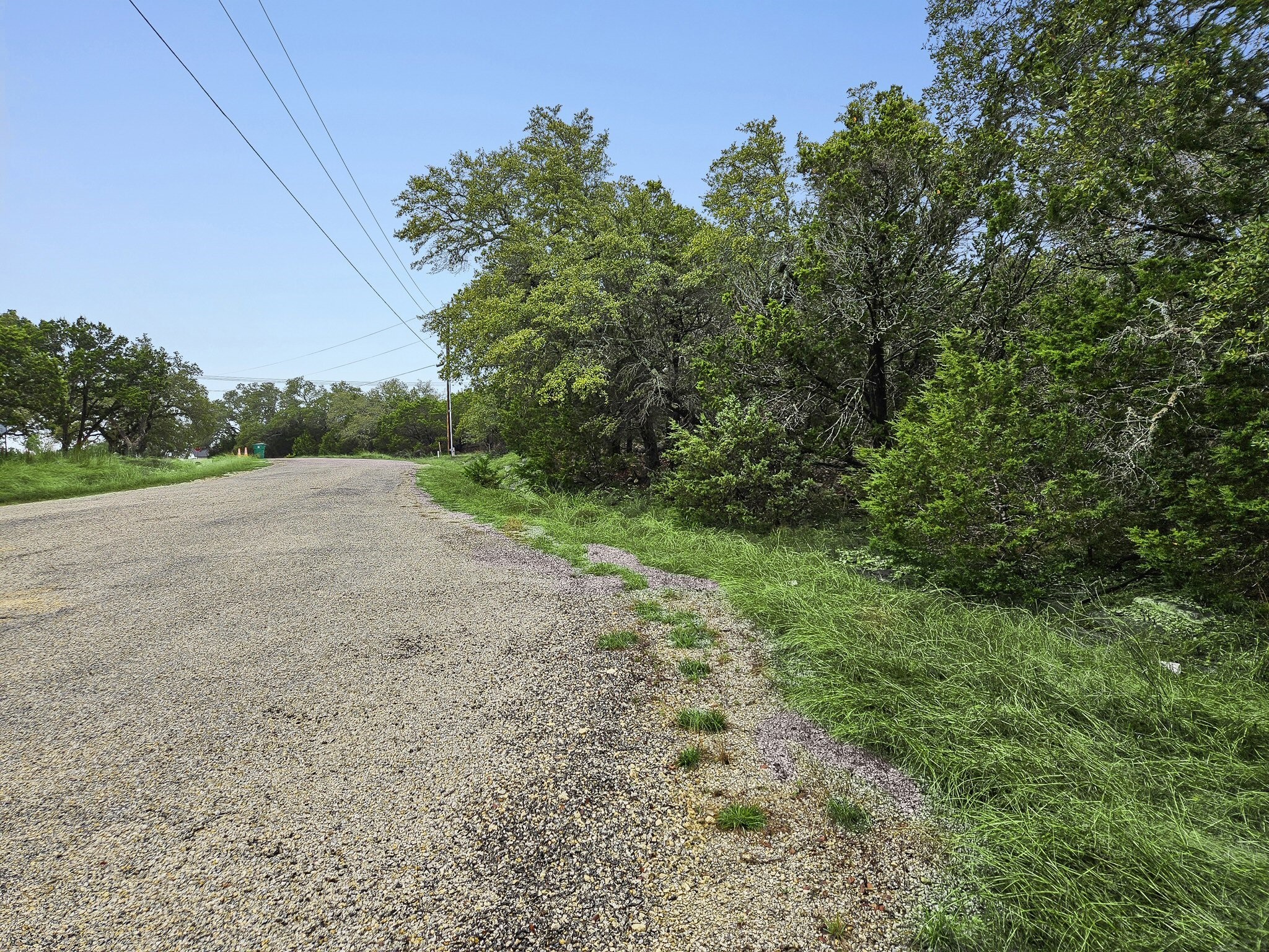 157 Verbena Circle Spring Branch, TX 78070 - Photo 22 of 32 a view of a field with trees in background