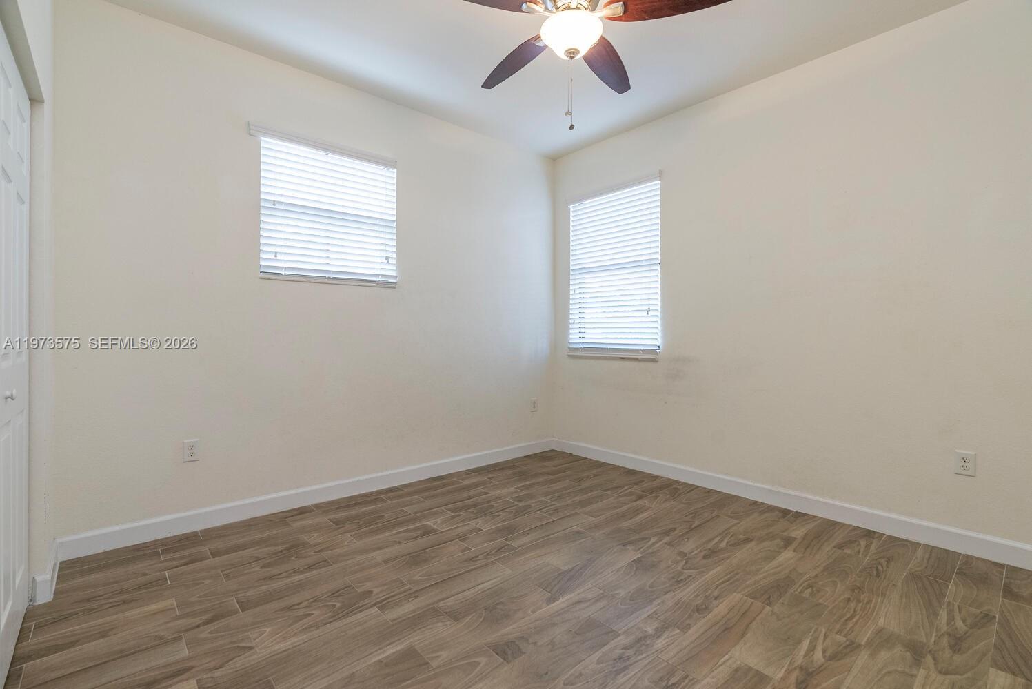 516 Southeast 35th Terrace Homestead, FL 33033 - Photo 15 of 25 an empty room with a window