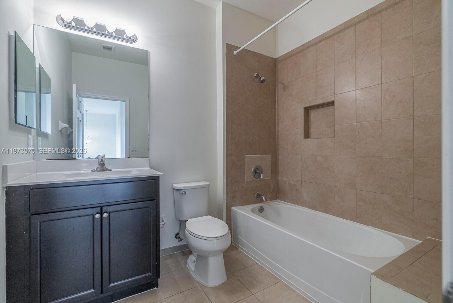 516 Southeast 35th Terrace Homestead, FL 33033 - Photo 17 of 25 a bathroom with a sink a toilet and shower