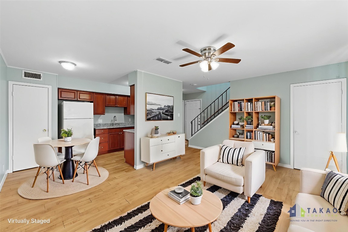 2208 Mission Hill Drive, Unit 103 Austin, TX 78741 - Photo 2 of 26 a living room with furniture and a large window