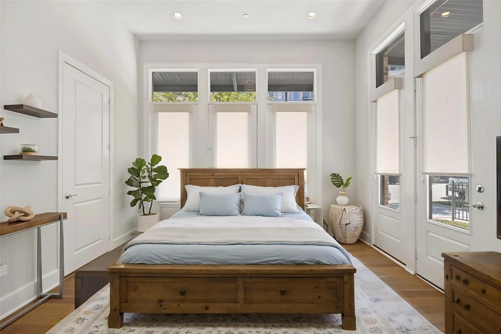 15015 Oak Street Addison, TX 75001 - Photo 29 of 33 a bedroom with a bed and a window