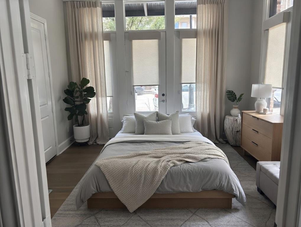 15015 Oak Street Addison, TX 75001 - Photo 33 of 33 a bedroom with a bed and a large window