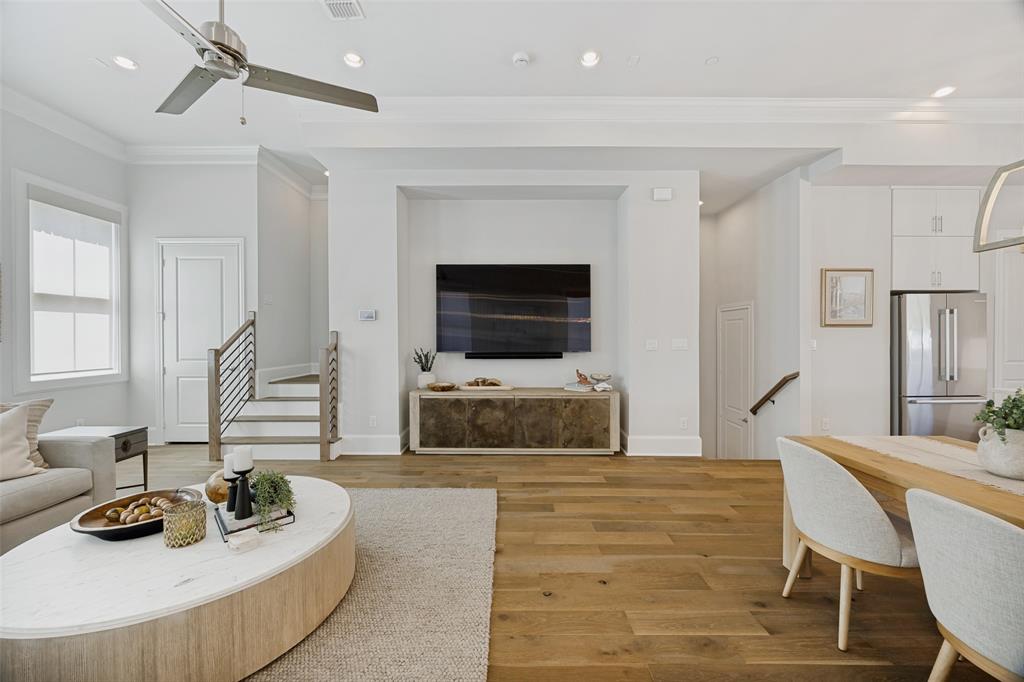 15015 Oak Street Addison, TX 75001 - Photo 6 of 33 a living room with furniture and a flat screen tv