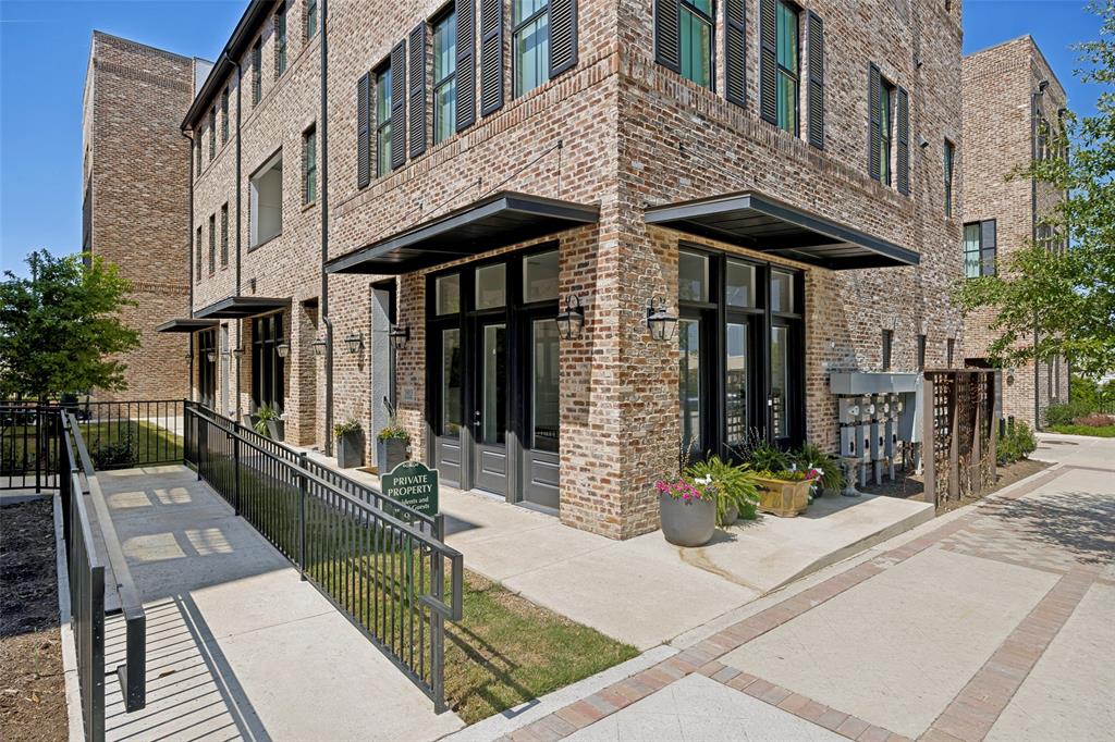 15015 Oak Street Addison, TX 75001 - Photo 9 of 33 a view of a building with sitting area