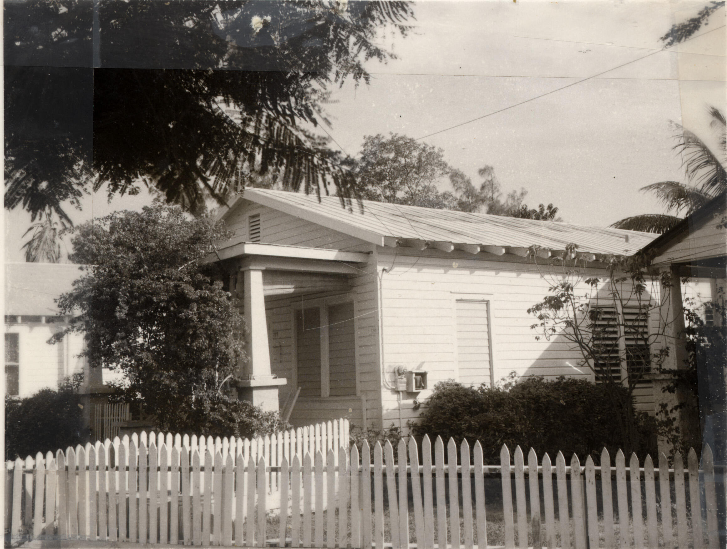 719 Elizabeth Street Key West, FL 33040 - Photo 5 of 15 a front view of a house with a garden