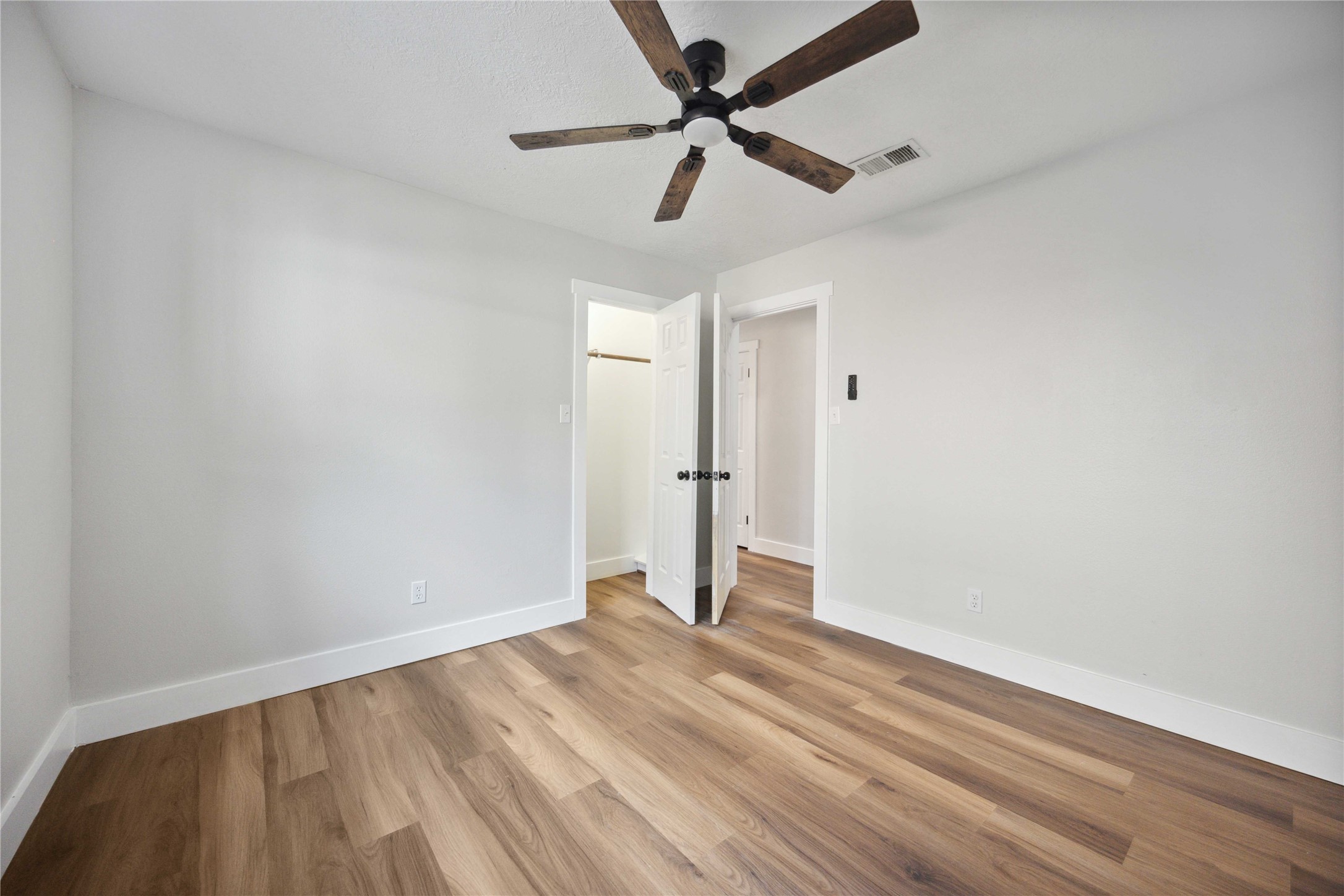 7907 12 Fairway Lane Humble, TX 77346 - Photo 21 of 42 wooden floor in an empty room
