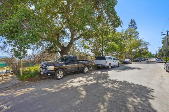 a view of a car parked in a parking lot
