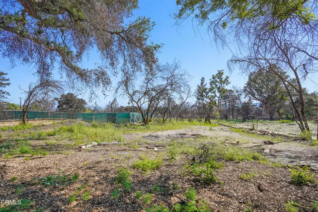 a view of swimming pool with a yard