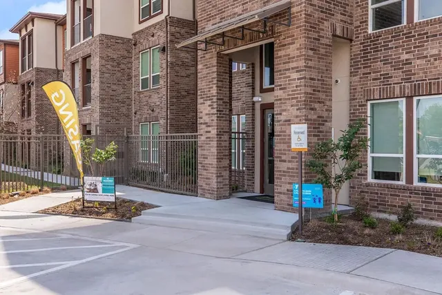 a swimming pool with outdoor seating