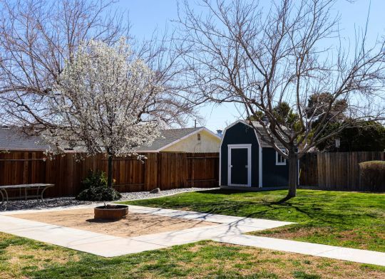218 South Lilac Street Ridgecrest, CA 93555 - Photo 29 of 43 a view of a house with a yard
