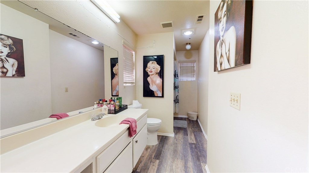 365 East Vodden Street Rialto, CA 92376 - Photo 15 of 37 Upstairs bathroom with shower and tub combo
