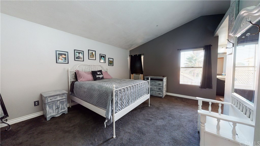 365 East Vodden Street Rialto, CA 92376 - Photo 21 of 37 Master bedroom featuring vaulted ceilings