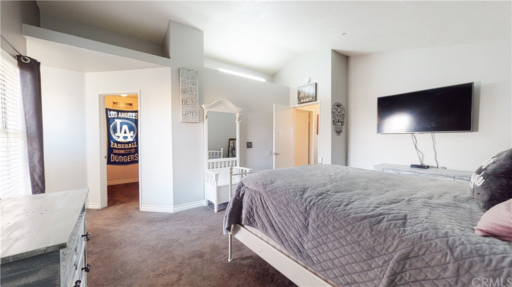 365 East Vodden Street Rialto, CA 92376 - Photo 23 of 37 Master bedroom with walk in closet with window