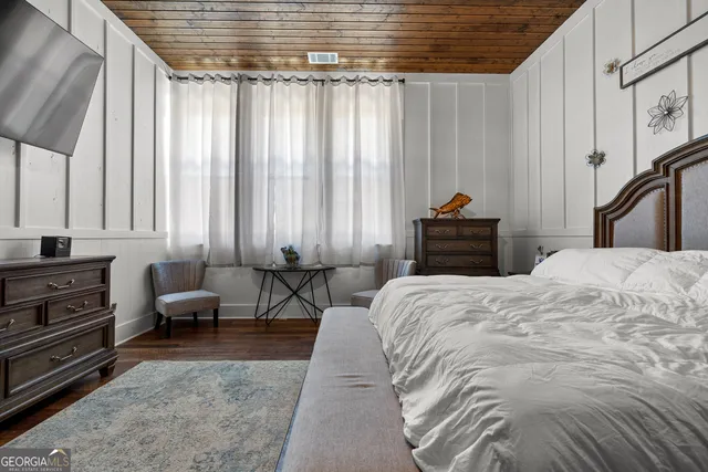 a bathroom with 2 sink and a mirror