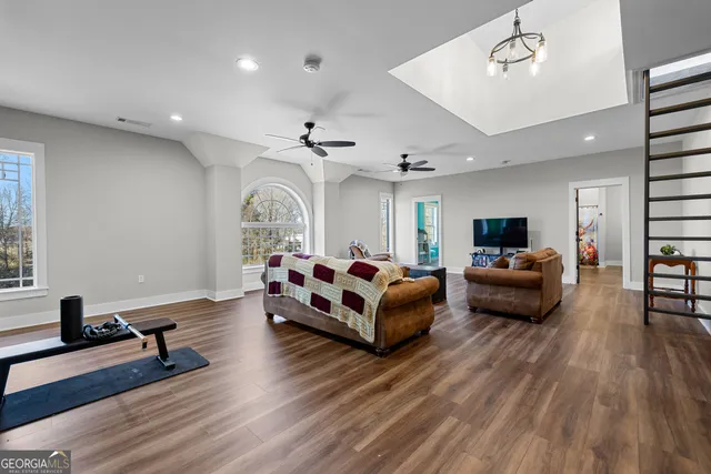 a front view of a building with a yard