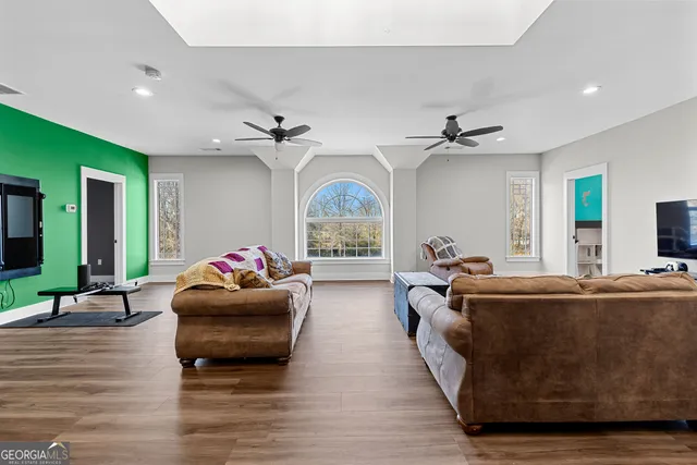 a view of a large body of water with a building in the background