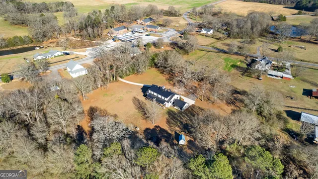 a view of a dining room with furniture wooden floor and chandelier