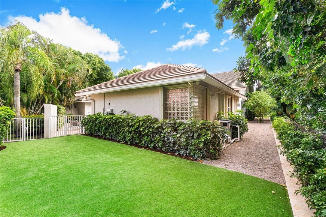 2934 Needham Court Delray Beach, FL 33445 - Photo 27 of 45 New Artificial turf grass and dog run.