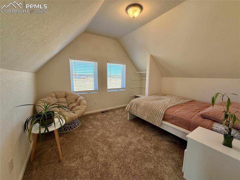 61 Stripling Lane Divide, CO 80814 - Photo 21 of 47 a bedroom with a bed and window