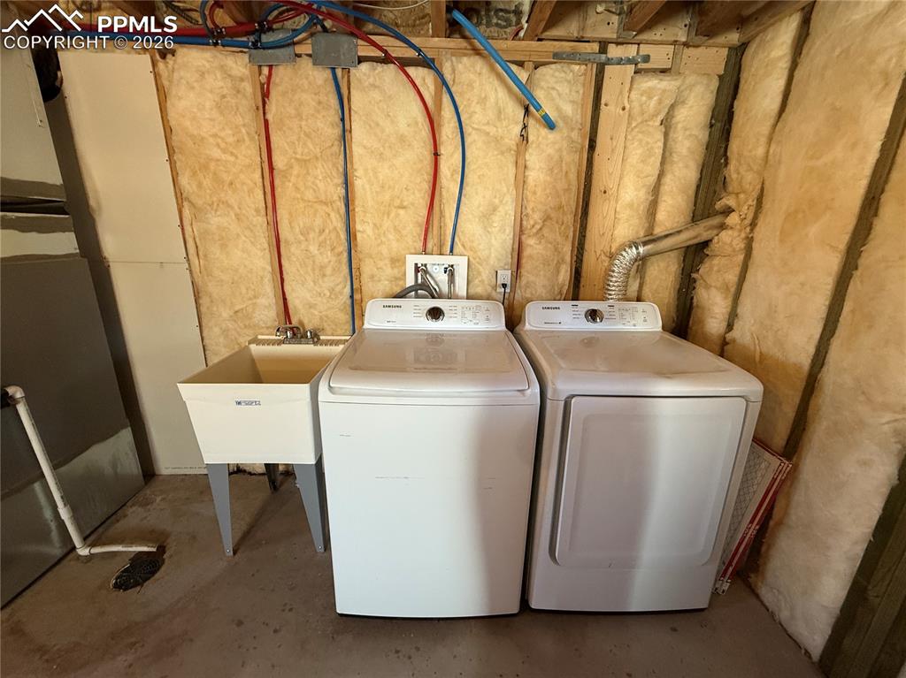 61 Stripling Lane Divide, CO 80814 - Photo 39 of 47 a utility room with dryer and washer