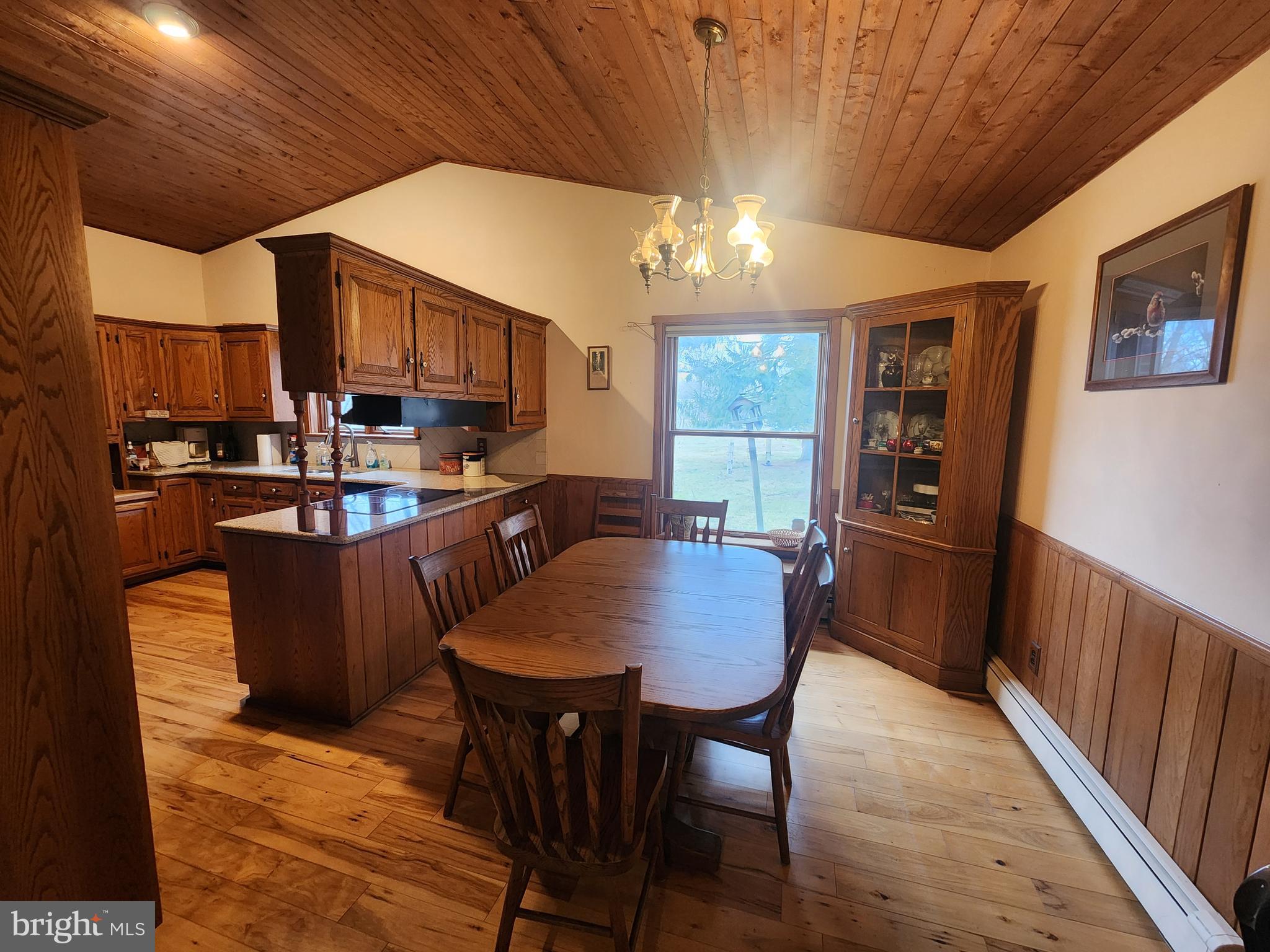 230 South Hertzler Road Elizabethtown, PA 17022 - Photo 24 of 78 a kitchen with a dining table chairs stainless steel appliances and cabinets