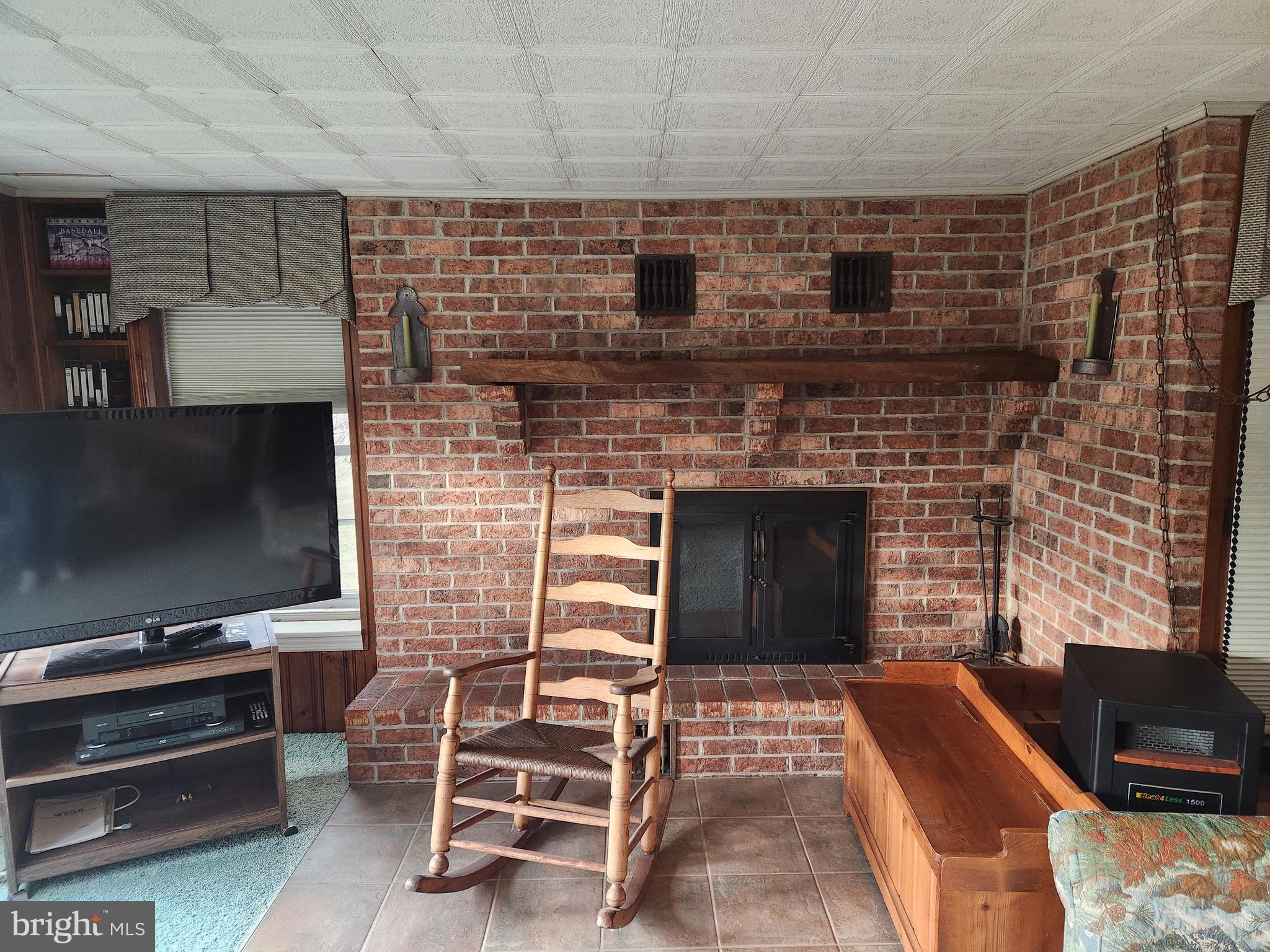 230 South Hertzler Road Elizabethtown, PA 17022 - Photo 28 of 78 a living room with furniture and a fireplace