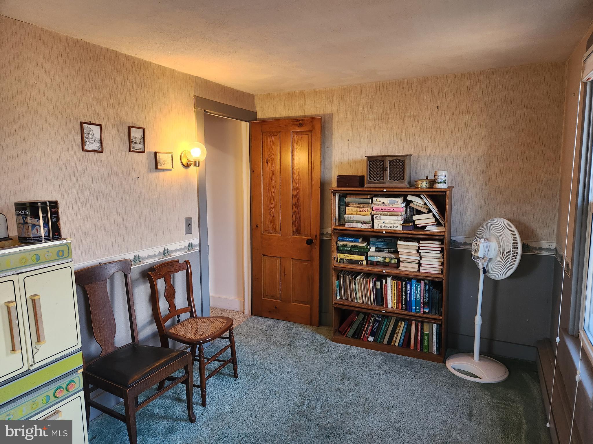 230 South Hertzler Road Elizabethtown, PA 17022 - Photo 36 of 78 a living room with furniture and a book shelf