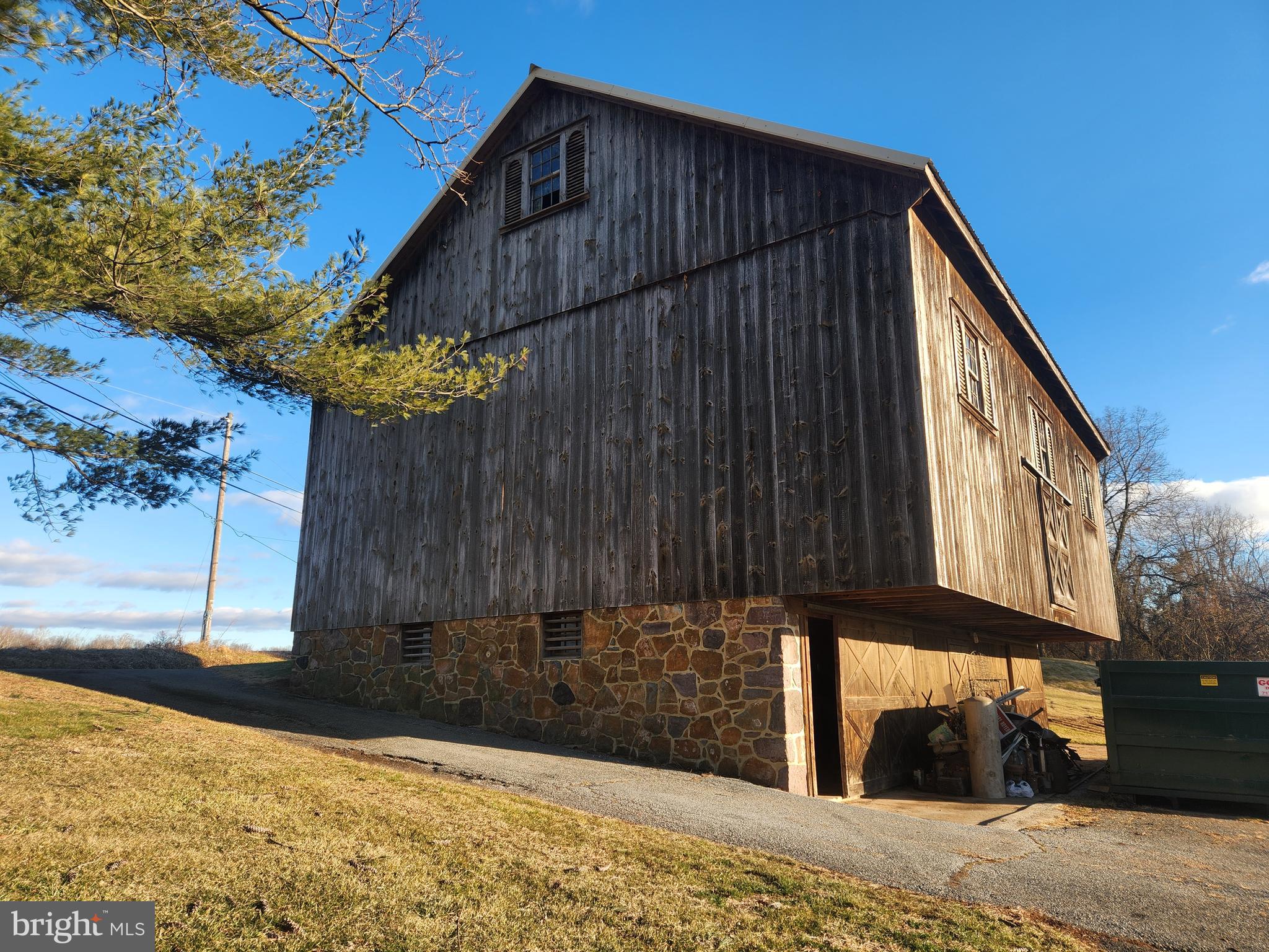 230 South Hertzler Road Elizabethtown, PA 17022 - Photo 50 of 78 a street view with wooden fence and a bench