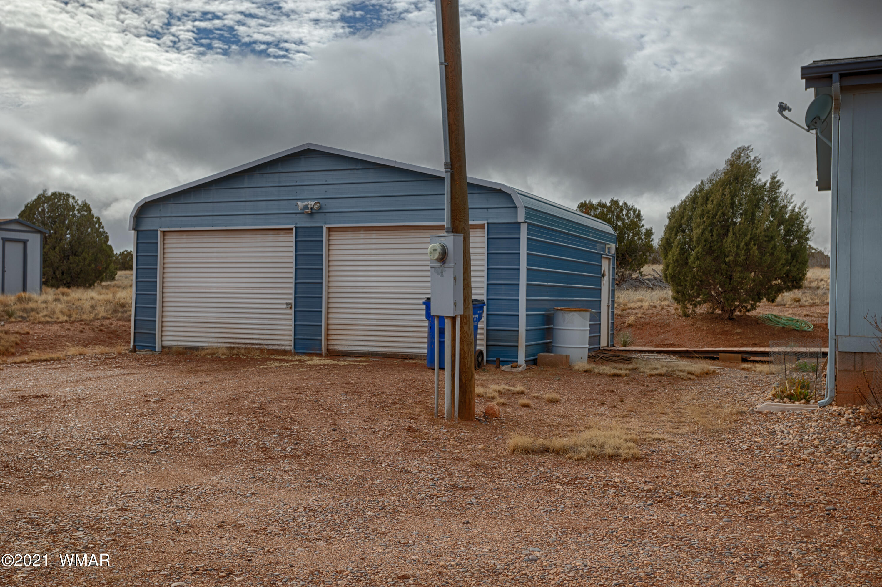 4464 Clydesdale Road Snowflake, AZ 85937 - Photo 24 of 30 a house with trees in the background