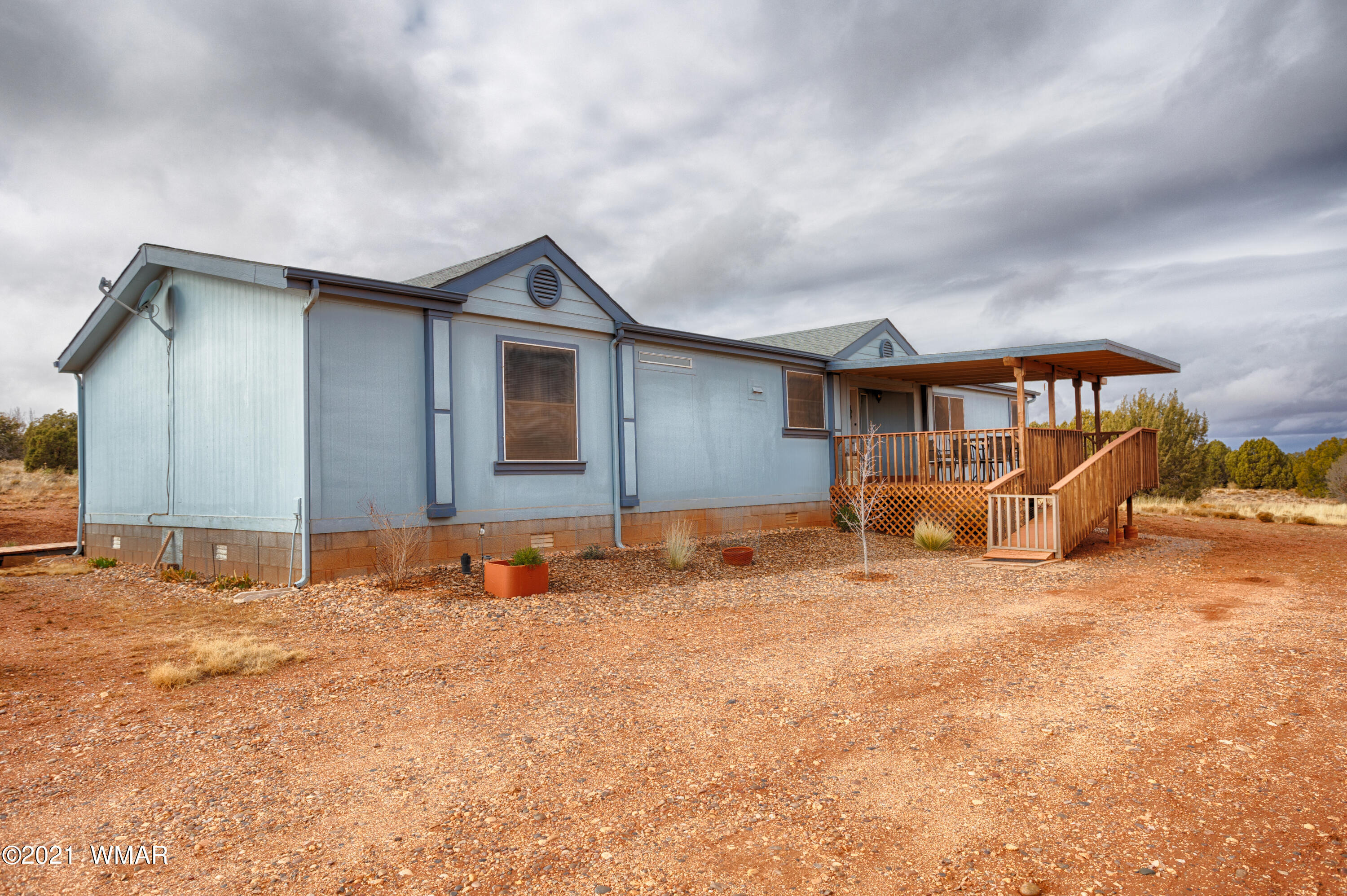 4464 Clydesdale Road Snowflake, AZ 85937 - Photo 3 of 30 a backyard of a house with table and chairs