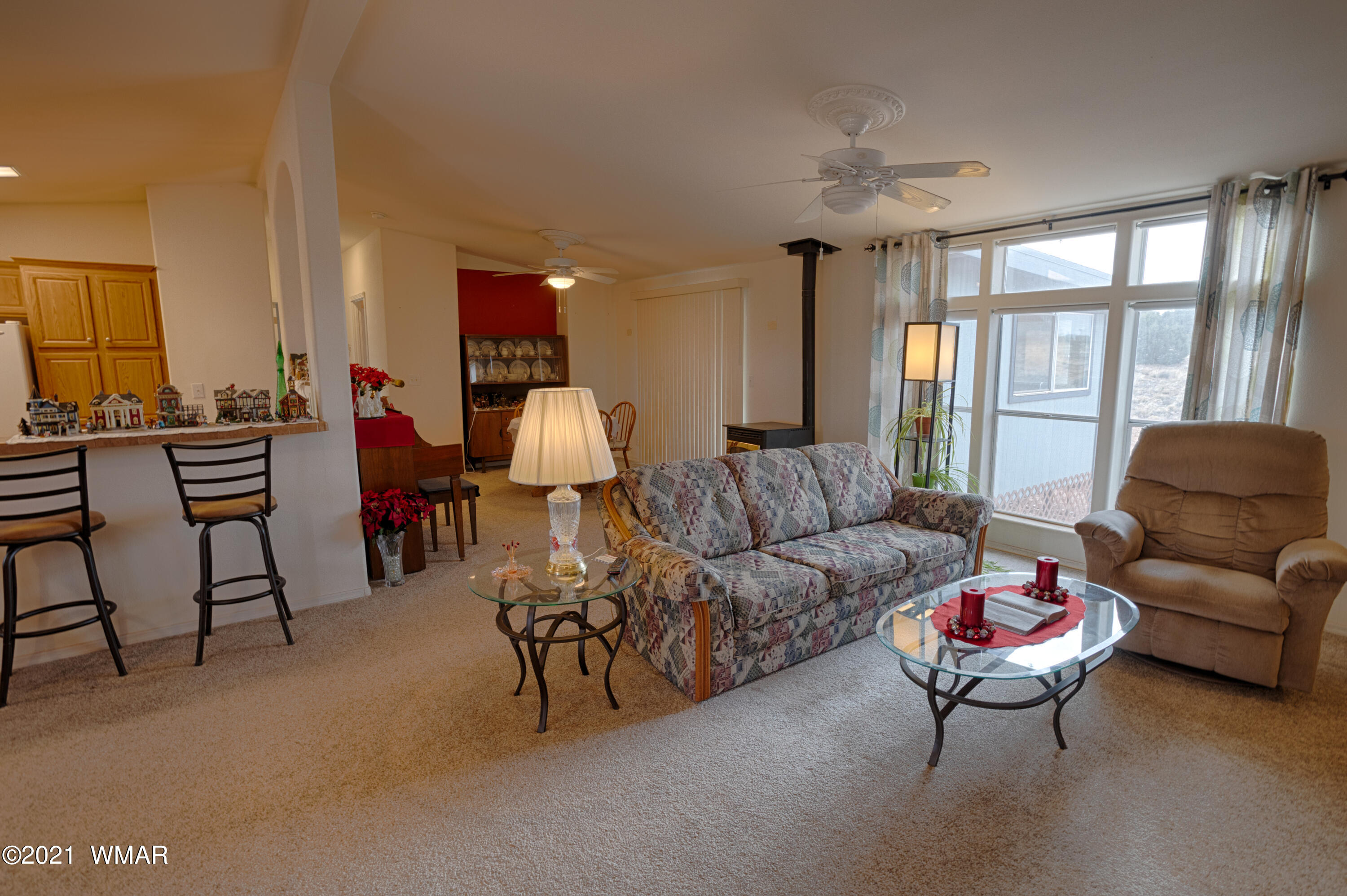 4464 Clydesdale Road Snowflake, AZ 85937 - Photo 7 of 30 a living room with furniture and a large window
