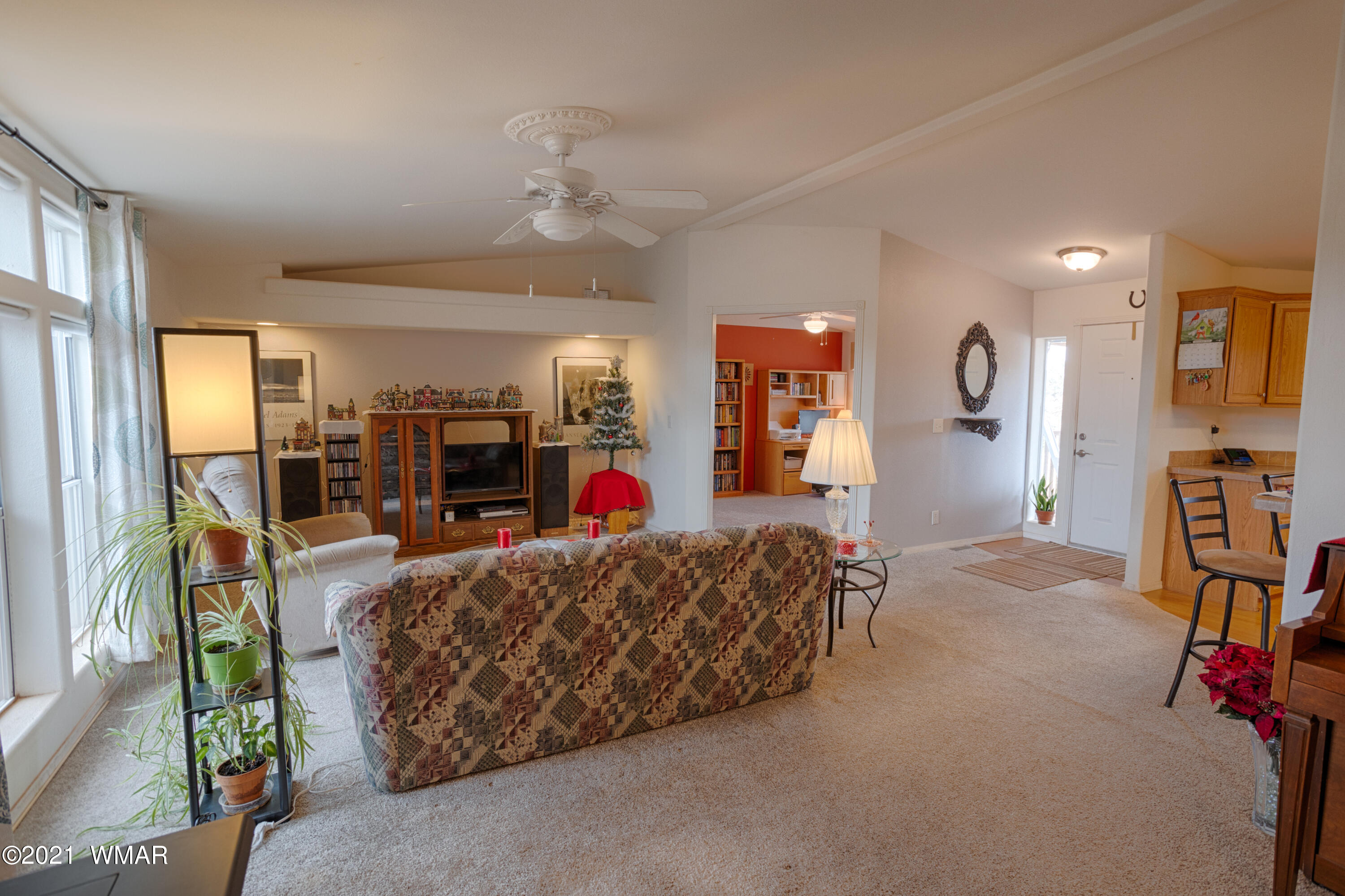 4464 Clydesdale Road Snowflake, AZ 85937 - Photo 8 of 30 a living room with furniture and a flat screen tv