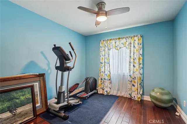 a very nice looking living room with a dining table and chairs
