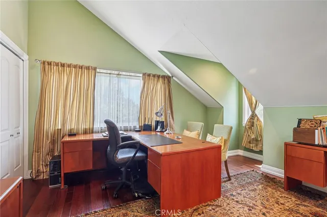 a view of a hallway with windows