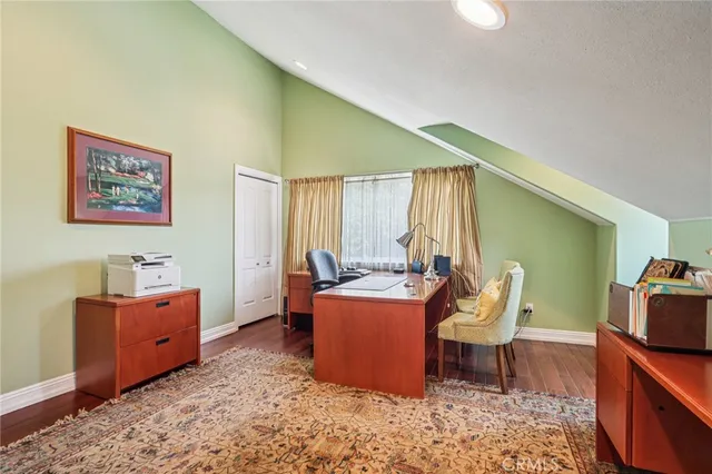 a bed room with a bed and a window