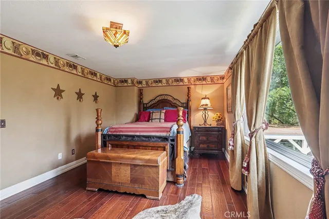 an aerial view of a house with a garden