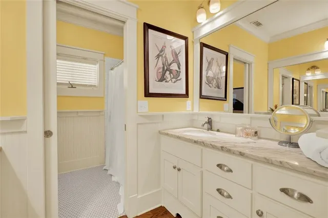 a view of staircase with wooden floor and white walls