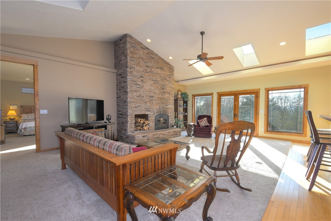 625 McAdams Road East Longview, WA 98632 - Photo 7 of 40 a living room with furniture and a flat screen tv