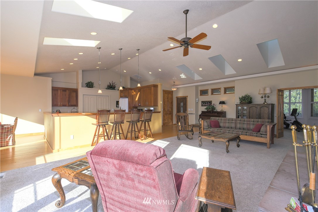 625 McAdams Road East Longview, WA 98632 - Photo 9 of 40 a living room with lots of furniture and a view of kitchen