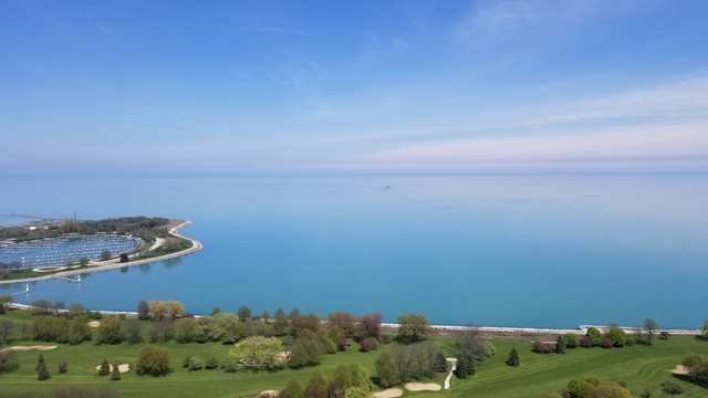 655 West Irving Park Road, Unit 4901 Chicago, IL 60613 - Photo 14 of 16 an aerial view of a house with a yard