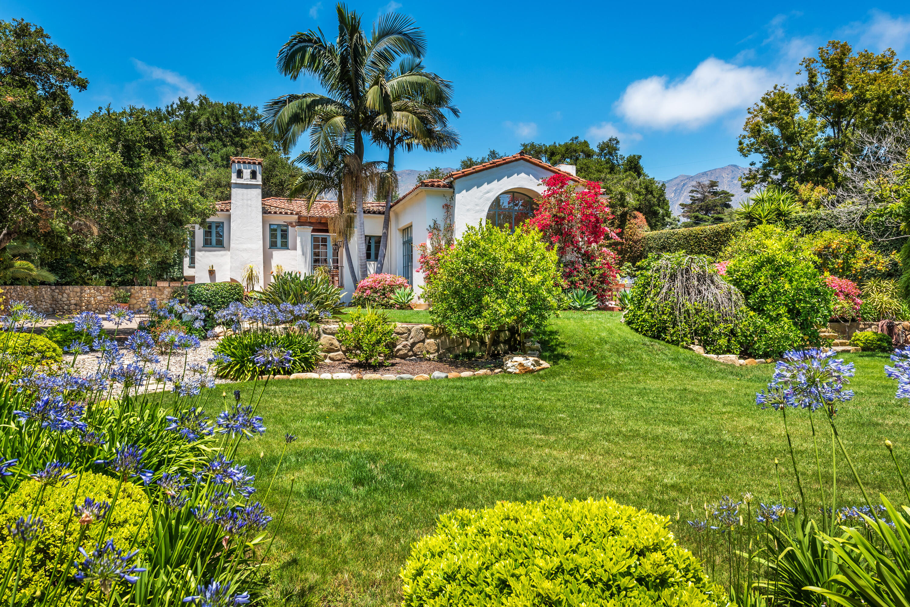 a house view with a garden space