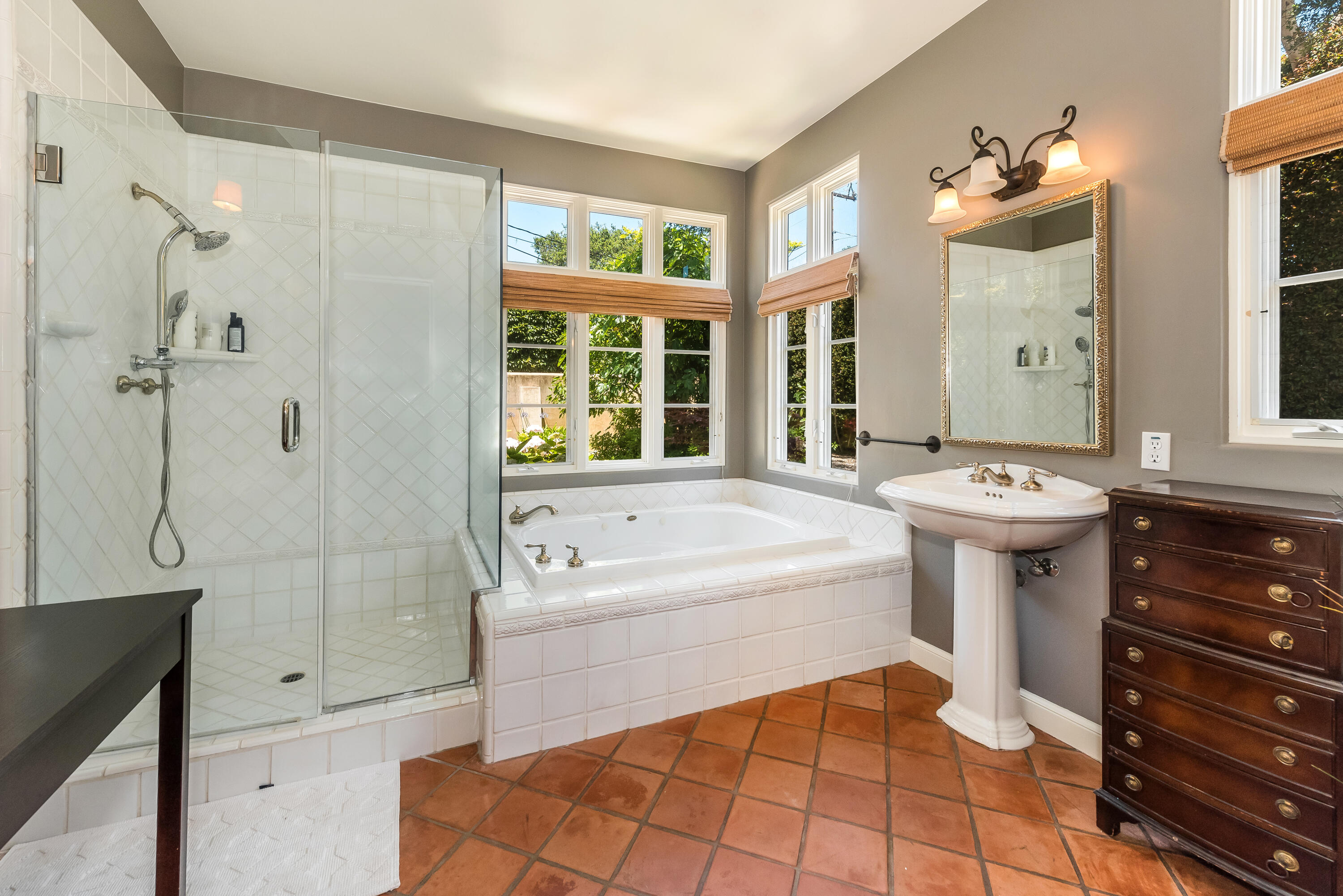 1394 School House Road Santa Barbara, CA 93108 - Photo 12 of 13 a bathroom with a sink a toilet and shower